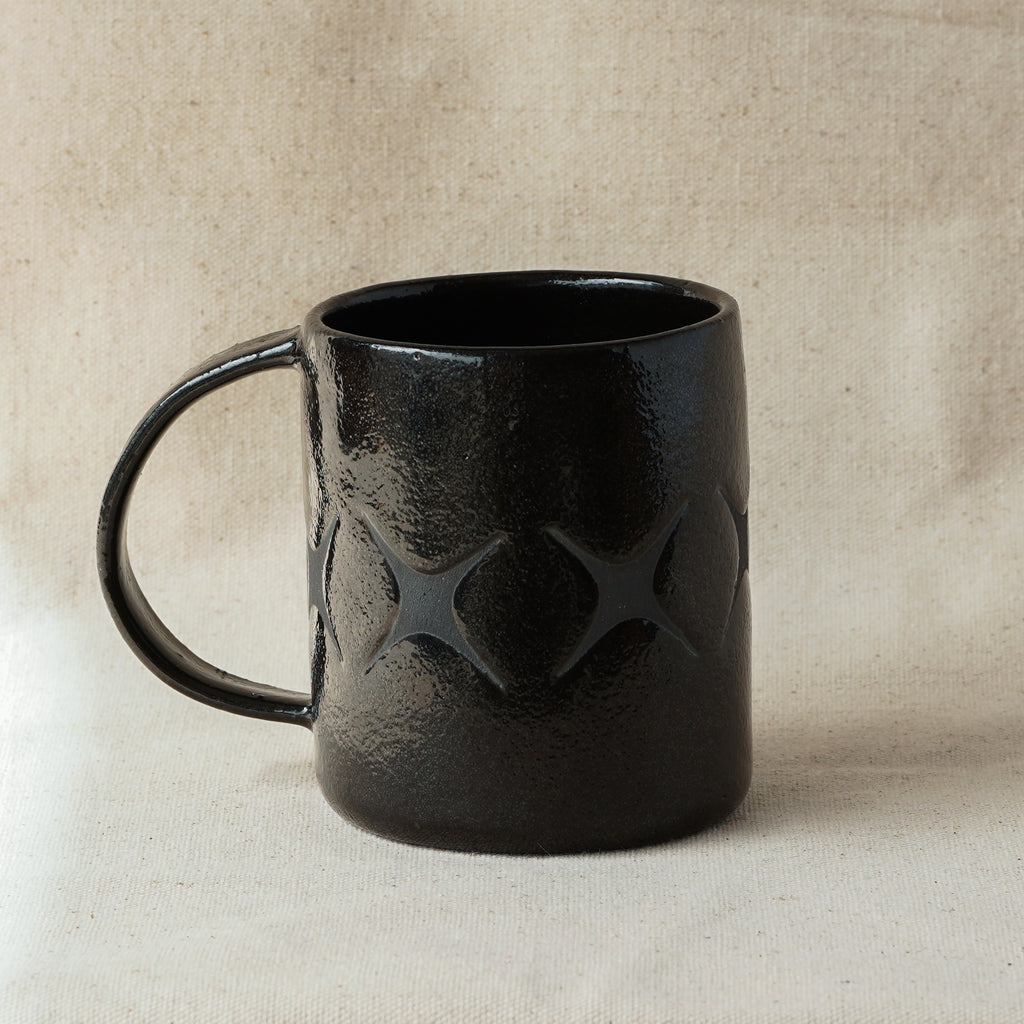 X Mug
