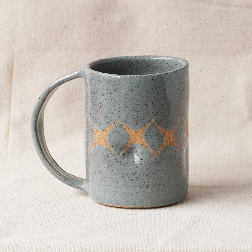 X Mug